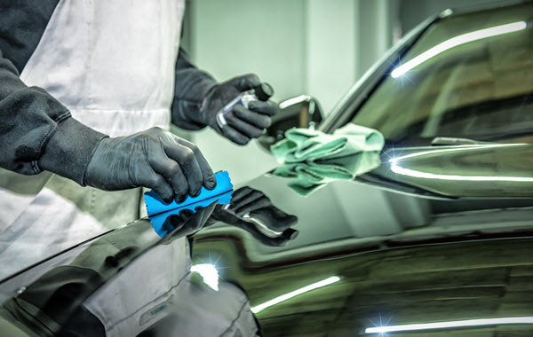Car Wash Worker Applying Ceramic Nano Coating